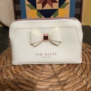 Ted Baker Aimee Glossy Bow cosmetic bag.